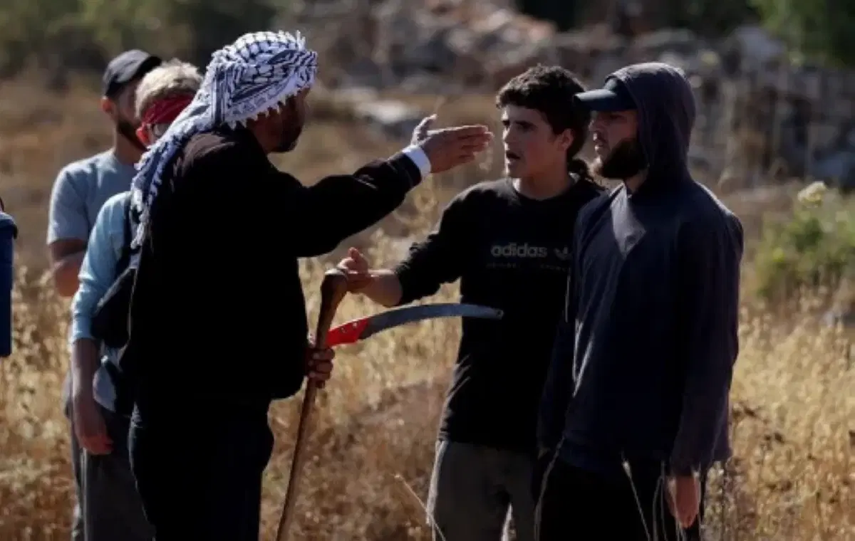 3 Palestinians and 2 foreign activists injured in settler attack south of the West Bank